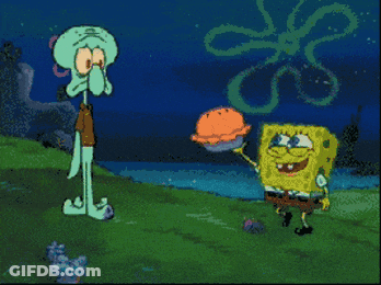 Cartoon Character Laying On Ground With Rock GIF