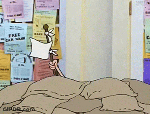 Cartoon Character Laying On Pile Of Pillows By Free Car Wash Ad GIF