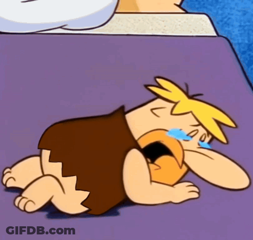 Cartoon Character Laying On Purple Surface Crying GIF