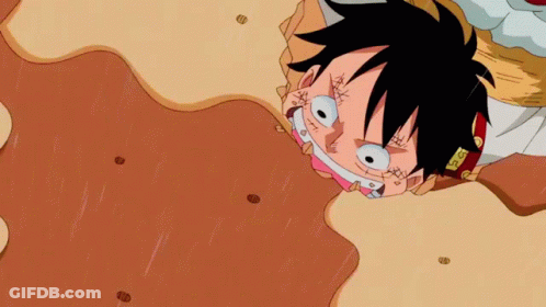 Cartoon Character Laying With Head In Mud GIF