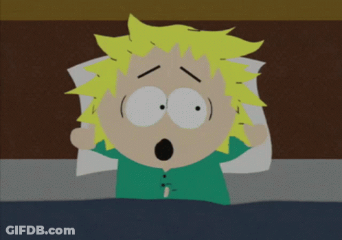 Cartoon Character Lying In Bed With Mouth Open GIF