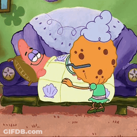 Cartoon Character Lying On Couch With Cookie GIF