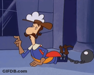 Cartoon Character Lying On Floor With Ball And Chain GIF