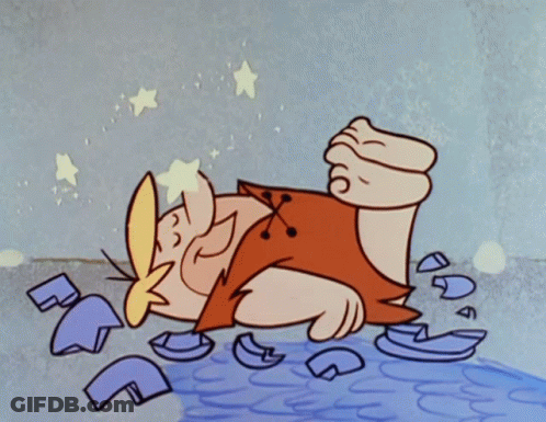 Cartoon Character Lying On Ground Surrounded By Broken Glass GIF