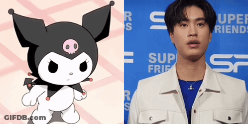 Cartoon Character Next To Young Man GIF