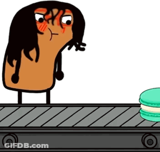 Cartoon Character On Conveyor Belt Next To Macaroons GIF