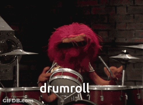 Cartoon Character Playing Drums Saying Drumroll GIF