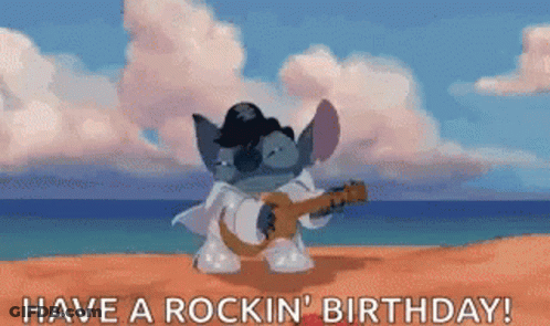 Cartoon Character Playing Guitar On Beach 'Have A Rockin Birthday GIF
