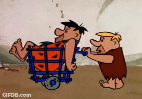 Cartoon Character Pushing Another In Wheelchair GIF