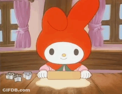 Cartoon Character Rolling Dough On Wooden Table GIF