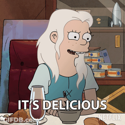 Cartoon Character Saying Its Delicious At Food Table GIF