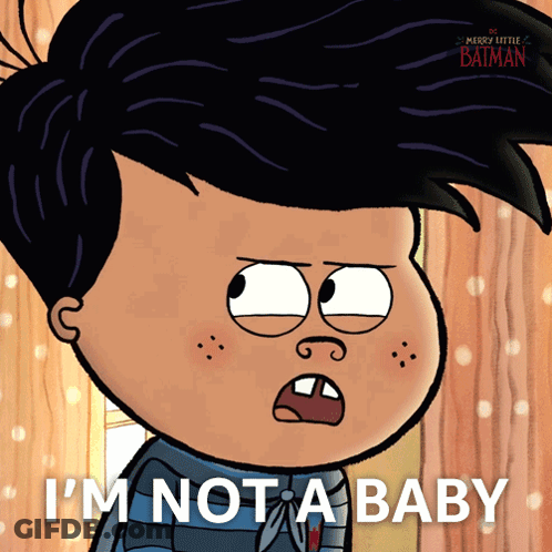 Cartoon Character Says I'm Not A Baby In Front Of Wooden Wall GIF