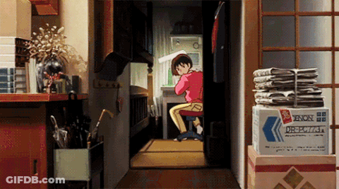 Cartoon Character Sitting At Desk Next To Xenon Box GIF