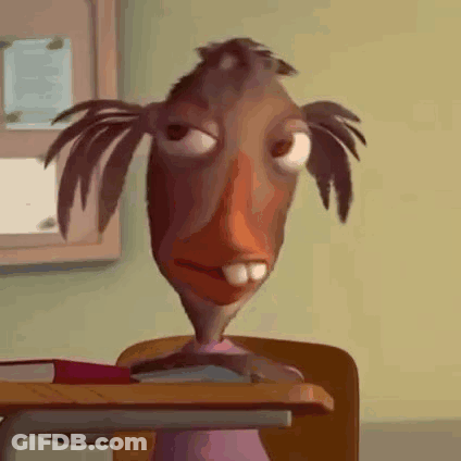 Cartoon Character Sitting At Desk With Book GIF