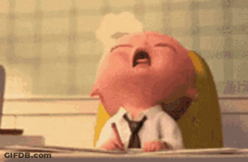 Cartoon Character Sitting At Desk With Open Mouth GIF