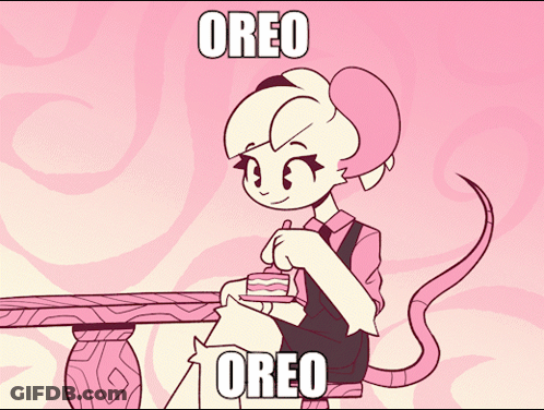 Cartoon Character Sitting At Table With Cake And Oreo GIF