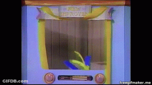 Cartoon Character Sitting In Box Saying New Improved GIF