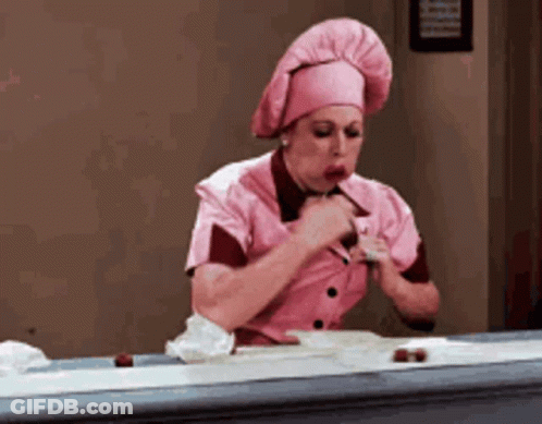 Cartoon Character Sitting In Chair With Sweet Chocolate GIF