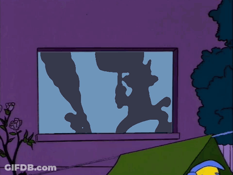 Cartoon Character Sitting In Green Tent GIF