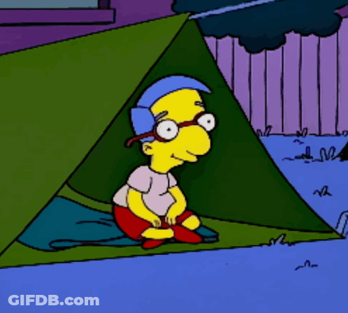 Cartoon Character Sitting In Tent With Glasses GIF