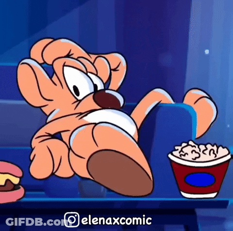 Cartoon Character Sitting Next To Popcorn GIF