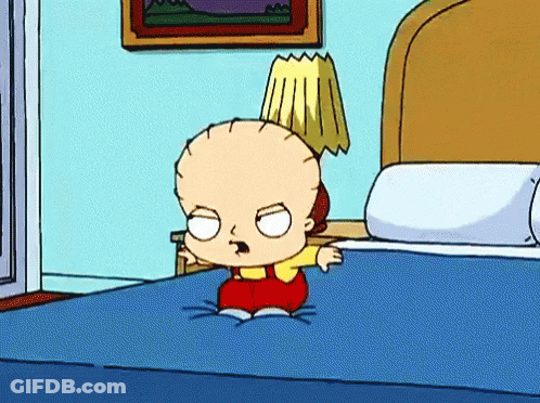 Cartoon Character Sitting On Bed With Lamp On Head GIF