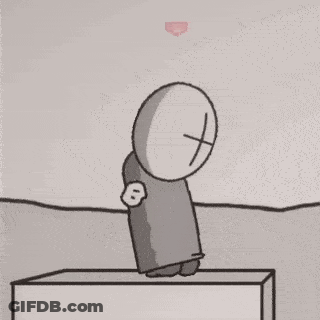 Cartoon Character Sitting On Block GIF