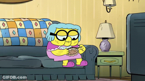 Cartoon Character Sitting On Couch Eating GIF