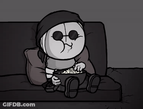 Cartoon Character Sitting On Couch Eating Popcorn GIF