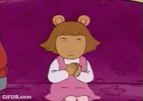 Cartoon Character Sitting On Purple Couch GIF
