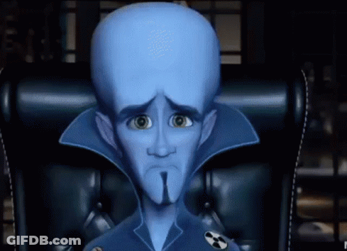 Cartoon Character Sitting With Nuclear Symbol GIF