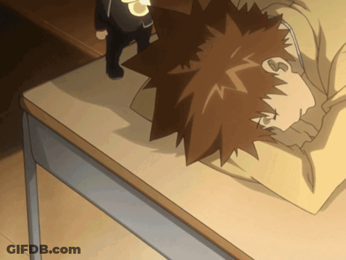 Cartoon Character Sleeping On Desk With Headphones GIF