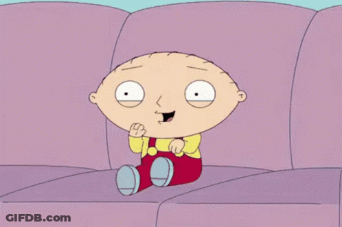 Cartoon Character Smiling On Purple Couch GIF