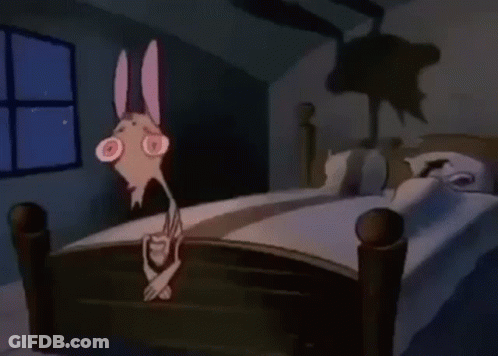 Cartoon Character Standing By Bed With Shadow GIF