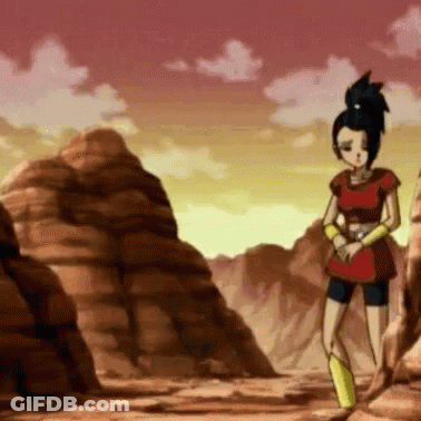 Cartoon Character Standing In Desert Surrounded By Rocks And Mountains GIF