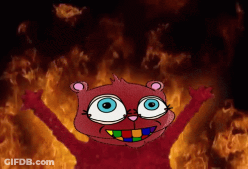 Cartoon Character Standing In Front Of Flames GIF