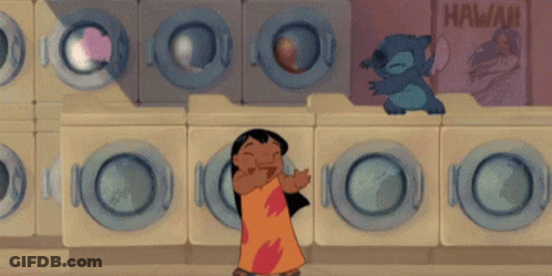 Cartoon Character Standing In Front Of Hawaii Laundromat GIF