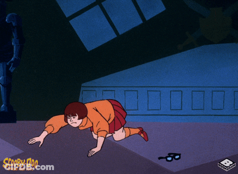 Cartoon Character Standing In Front Of Ice Sign GIF