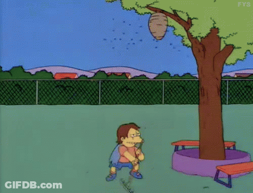 Cartoon Character Standing In Front Of Tree With Beehive GIF