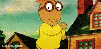 Cartoon Character Standing In Glasses And Yellow Sweater GIF