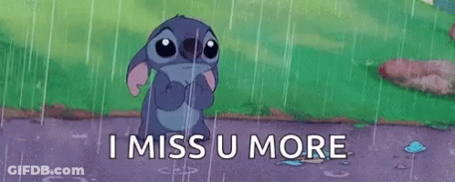 Cartoon Character Standing In Rain Saying I Miss U More GIF