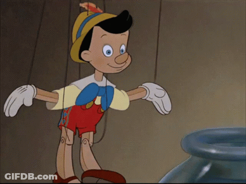 Cartoon Character Standing Next To Blue Vase GIF
