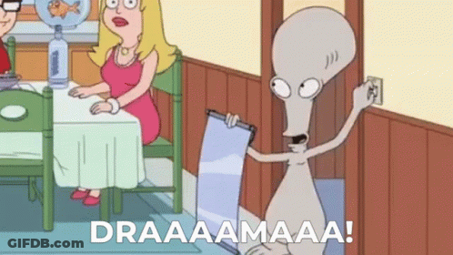 Cartoon Character Standing Next To Woman With Sign GIF