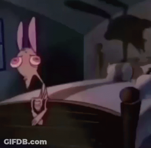 Cartoon Character Standing On Bed In Dark Room GIF