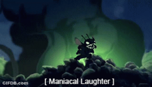 Cartoon Character Standing On Rocks With Maniacal Laughter GIF