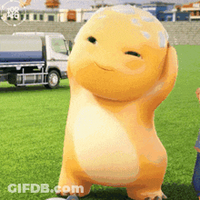 Cartoon Character Standing On Soccer Field GIF