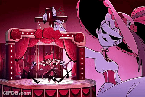 Cartoon Character Standing On Stage With Puppet GIF