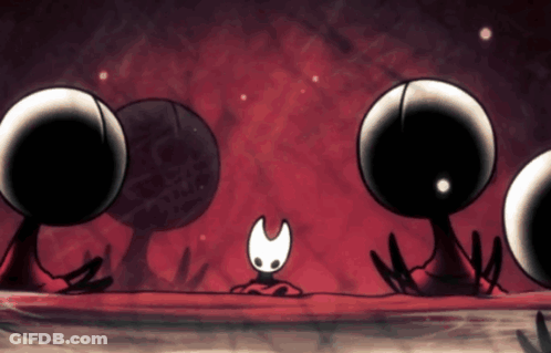 Cartoon Character Surrounded By Black Balls GIF