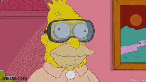 Cartoon Character Wearing Goggles And Smiling GIF