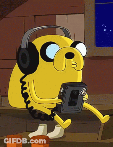 Cartoon Character Wearing Headphones And Holding Cassette Tape Player GIF